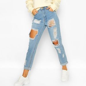 High waisted light washed distress mom jeans